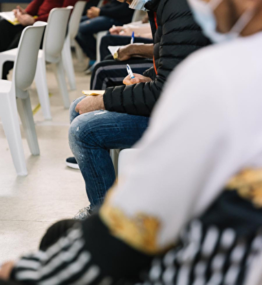 Detenu·es assistants à la conférence